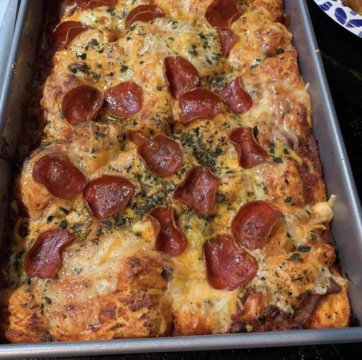 1 lb ground chicken breast or turkey 1/2 diced white onion 1 can whole kernel corn 1 can of black beans 1 tbsp taco seasoning 2 tbsp taco sauce 1/4 cup fat-free sour cream 1/2 cup fat-free shredded cheddar cheese 1 cup diced fresh tomatoes 1/3 cup green onions